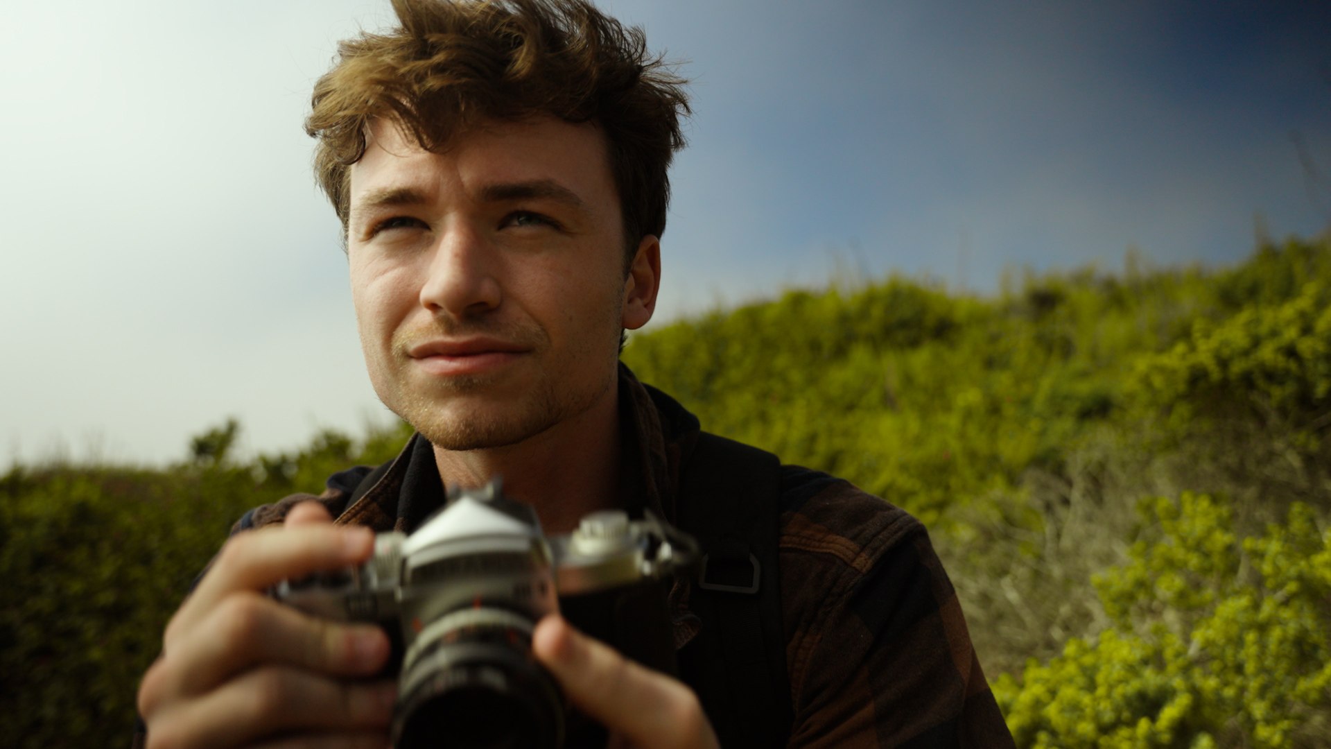 Dakota Martin holding a film camera